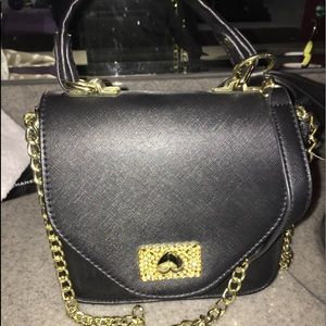 NWOT. GORGEOUS BLACK BAG WITH GOLD EMBELLISHMENTS